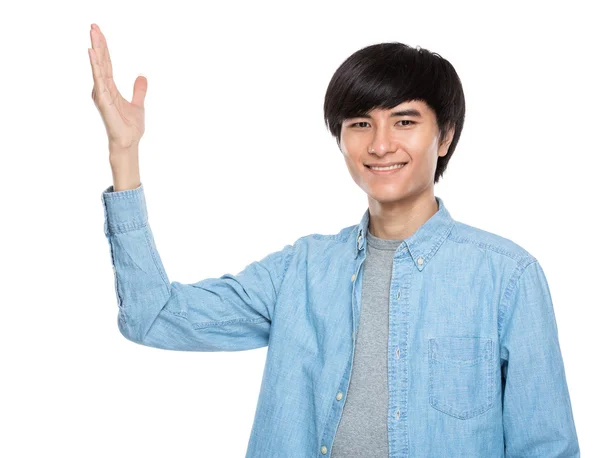 Young man with hand presentation — Stock Photo, Image