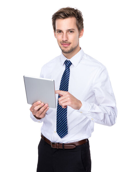 Caucasian businessman use digital tablet