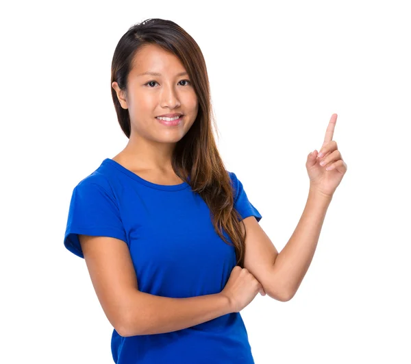Aziatische vrouw met vinger punt omhoog — Stockfoto