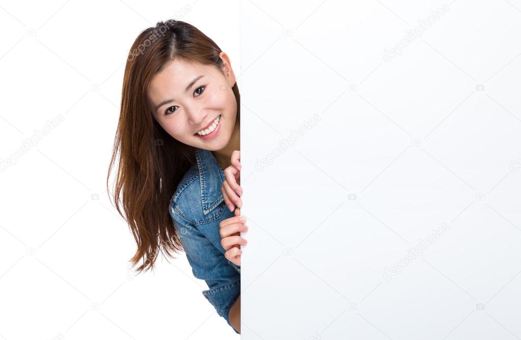 Happy woman hold blank billboard
