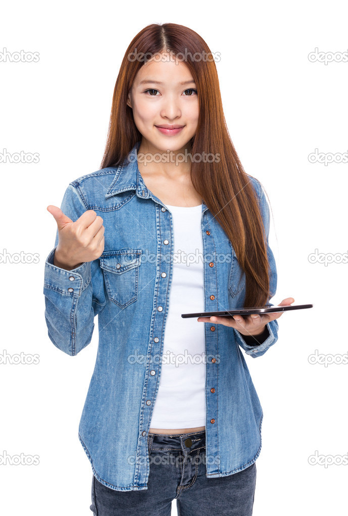 Woman hold tablet and thumb up