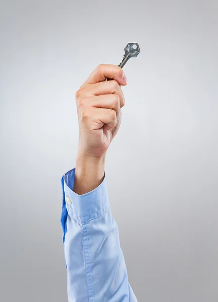 Άνθρωπος κατέχει με κλειδί — Φωτογραφία Αρχείου