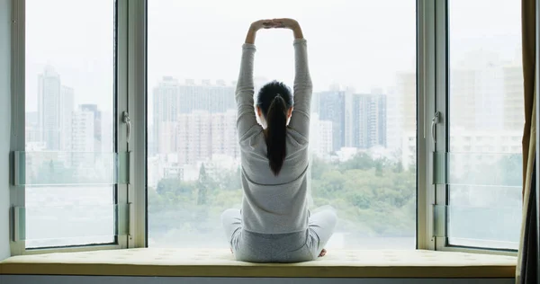 Woman Stretching Exercises Sit Front Window — Stock fotografie