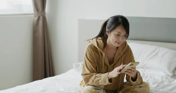 Woman Use Smart Phone Bed — 스톡 사진