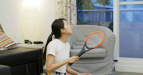 Woman Use Mosquito Swatter Home — стоковое фото