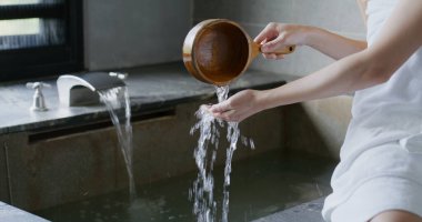Woman enjoy her hot spring at winter time
