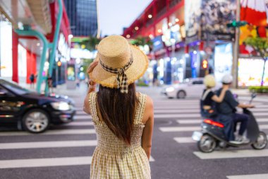 Travel woman in Xinyi district of Taipei city