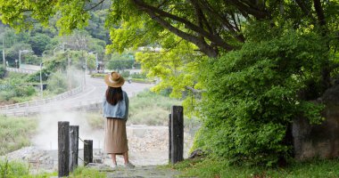 Woman look at the scenery view in forest