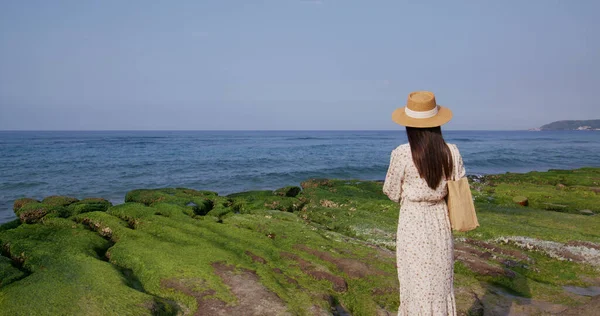 Travel woman visit Laomei Green Reef in Taiwan