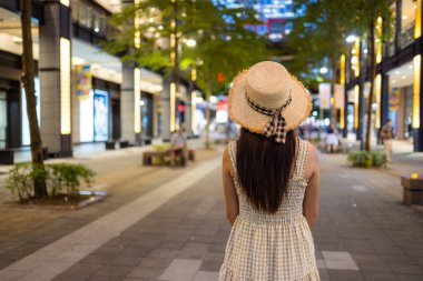 Travel woman in Xinyi district of Taipei city