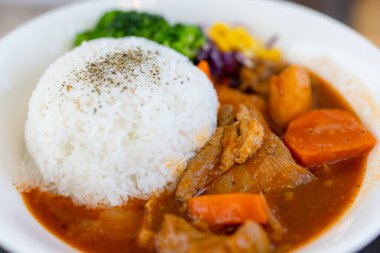 Vegetable and pork rice dish