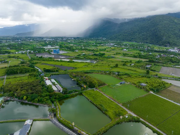 Top view of fish pond and field in Hualien of Taiwan