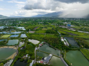 Top view of fish pond and field in Hualien of Taiwan