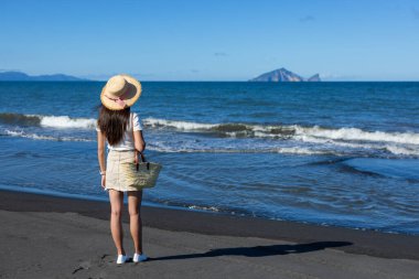 Travel woman look at the sea in manbo beach