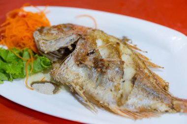 Grill fish dish in restaurant