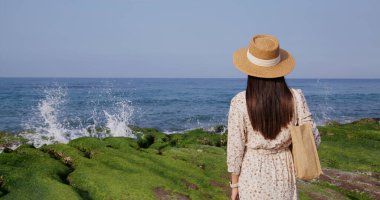 Travel woman visit Laomei Green Reef in Taiwan