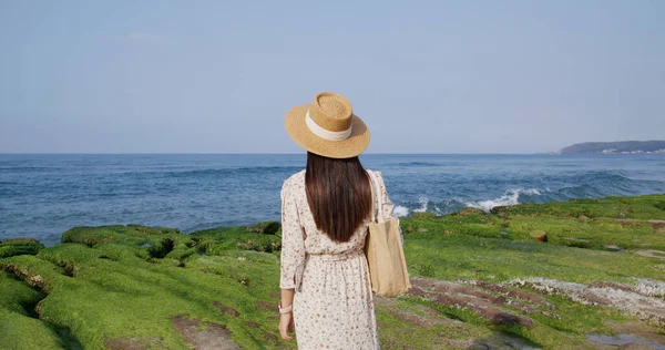 Travel woman visit Laomei Green Reef in Taiwan