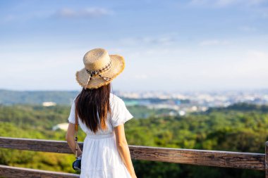 Woman enjoy the view on mountain