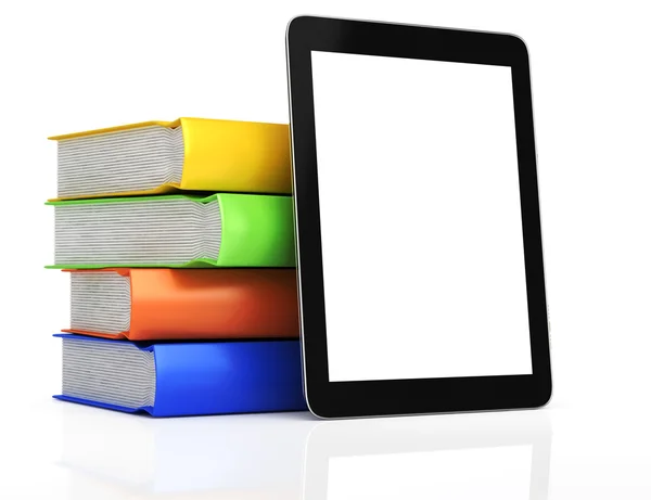 Tablet-Computer und Bücherstapel Stockfoto