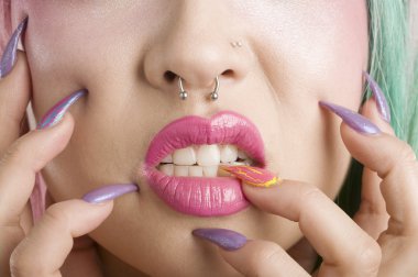 Close-up of a woman's mouth and fingers clipart