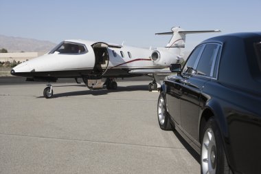 Luxurious Car And Airplane clipart