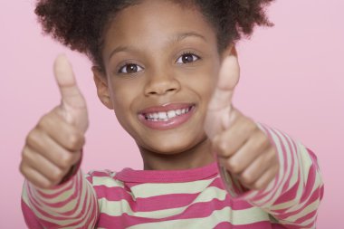 Happy Girl Giving Double Thumbs Up clipart