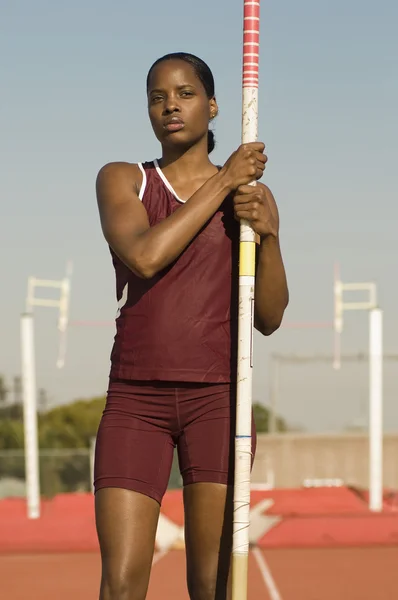 Pole Vaulter Standing With Pole — Stock Photo, Image