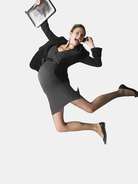 Excited Pregnant Businesswoman On Call Jumping — Stock Photo, Image