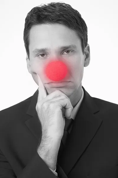 Sad Businessman Wearing Clown Nose — Stock Photo, Image