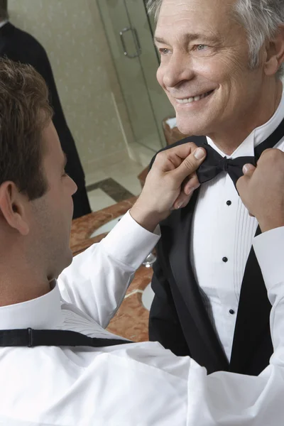 Happy senior man with bow tie — Stock Photo, Image