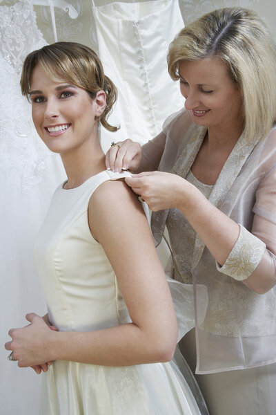 Mother Ddressing Up Bride
