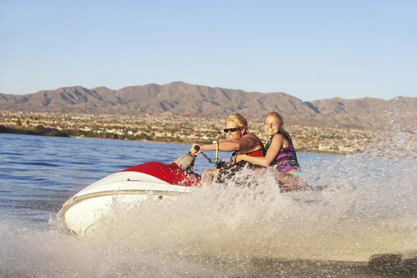 Young Couple Riding PWC — Stock Photo, Image