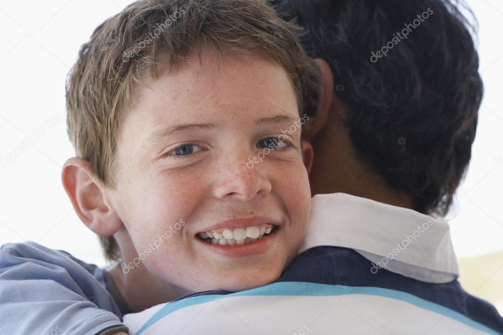 Happy Son Embracing Father