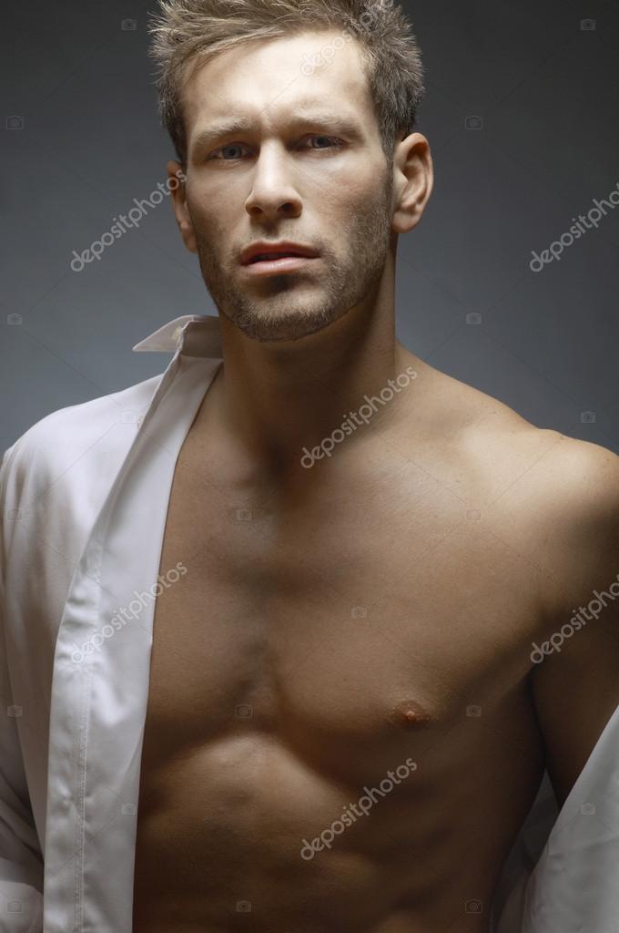 Man Wearing Unbuttoned Shirt Stock Photo by ©londondeposit 21788097