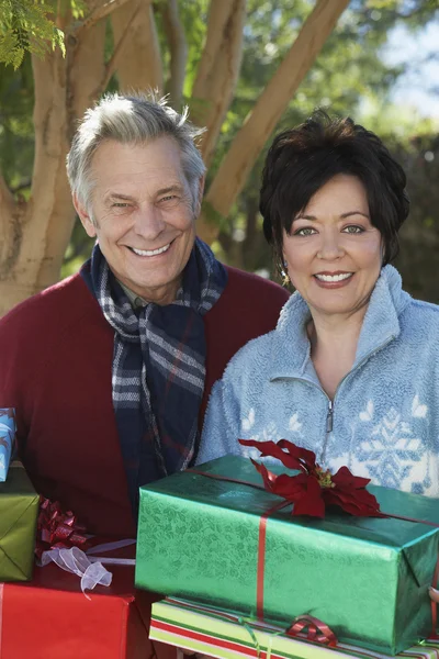 Multiethnic Couple With Gift Boxes Outdoors — Stock Photo, Image