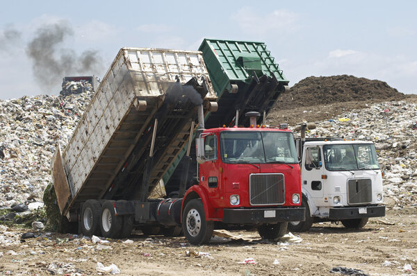 Truck with garbage at dump 