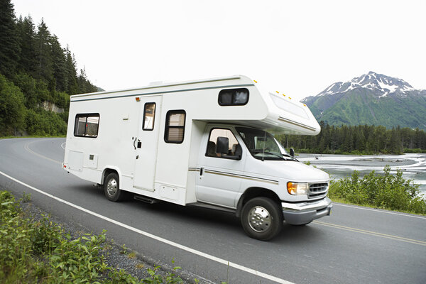USA, Alaska, Recreational Vehicle Driving On Road