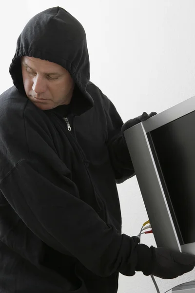 Burglar Stealing Television Set — Stock Photo, Image