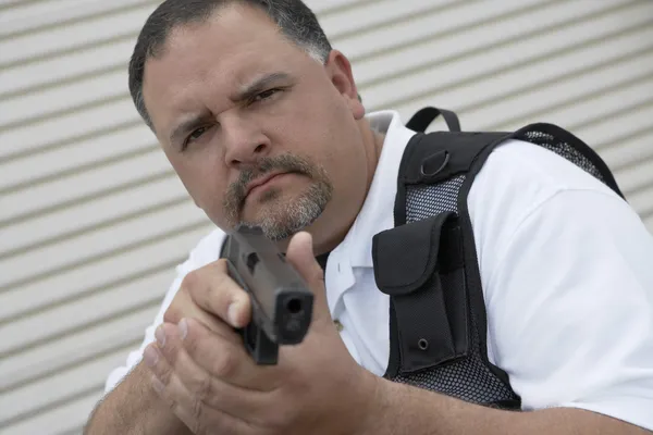 Security Guard In Bulletproof Vest Holding Gun — Stock Photo, Image