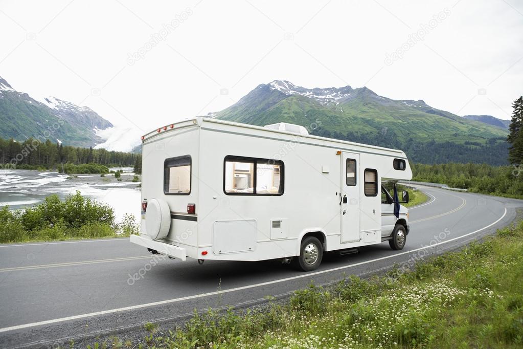 USA, Alaska, Recreational Vehicle Driving On Road