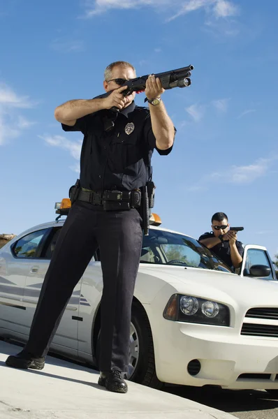 Police Officer Aiming Shotgun — Stock Photo, Image