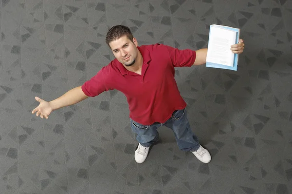 Male Student Standing With Arms Outstretched — Stock Photo, Image