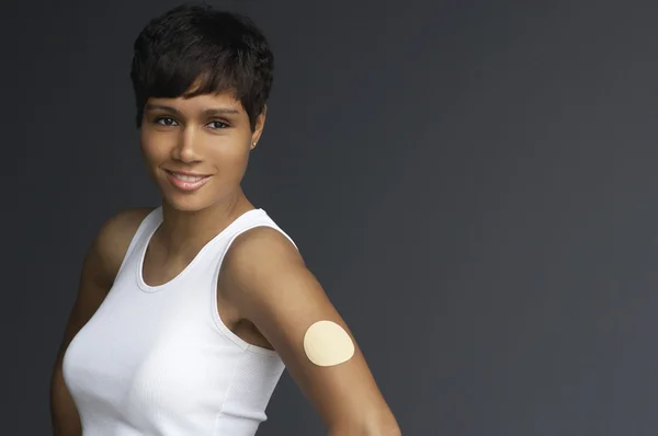 Woman With Nicotine Patch On Arm — Stock Photo, Image