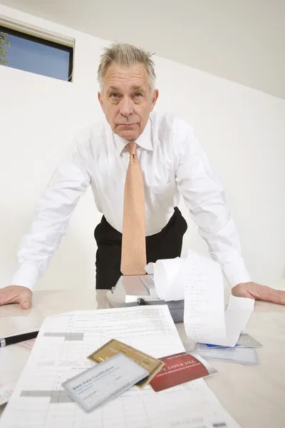 Businessman With Calculator Paper And Credit Cards — Stock Photo, Image