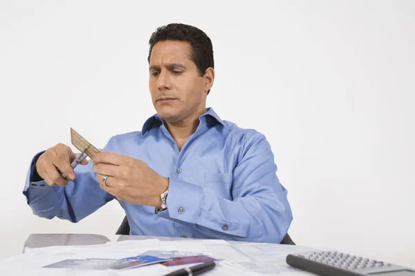 Man Cutting Up Credit Card — Stock Photo, Image