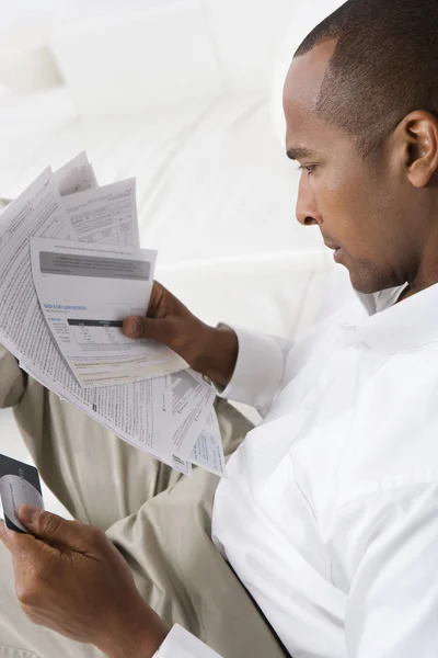 Man Checking Bills — Stock Photo, Image