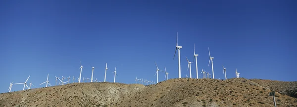 Aligned Windmills Against Blue Sky — Stock Photo, Image