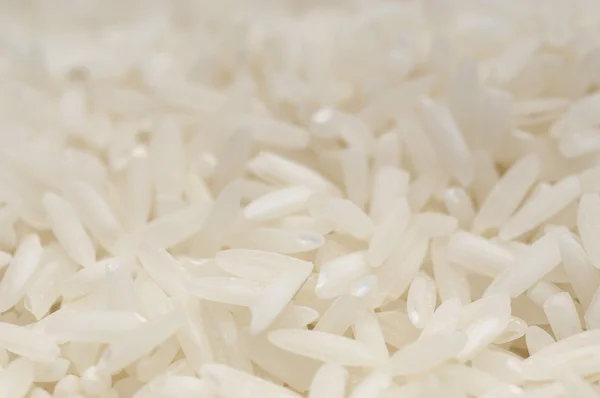 Невареный рис — стоковое фото