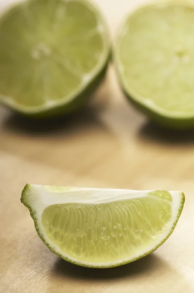 Lime Pieces On Surface — Stock Photo, Image