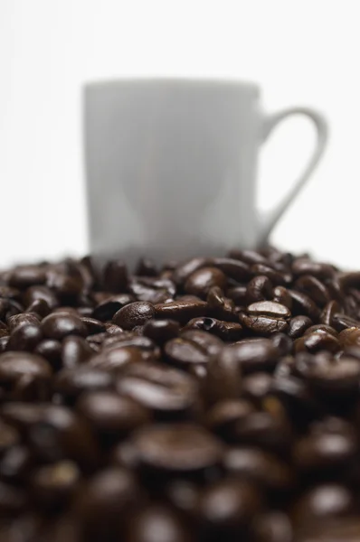 Coffee Cup On Heap Of Beans — Stock Photo, Image